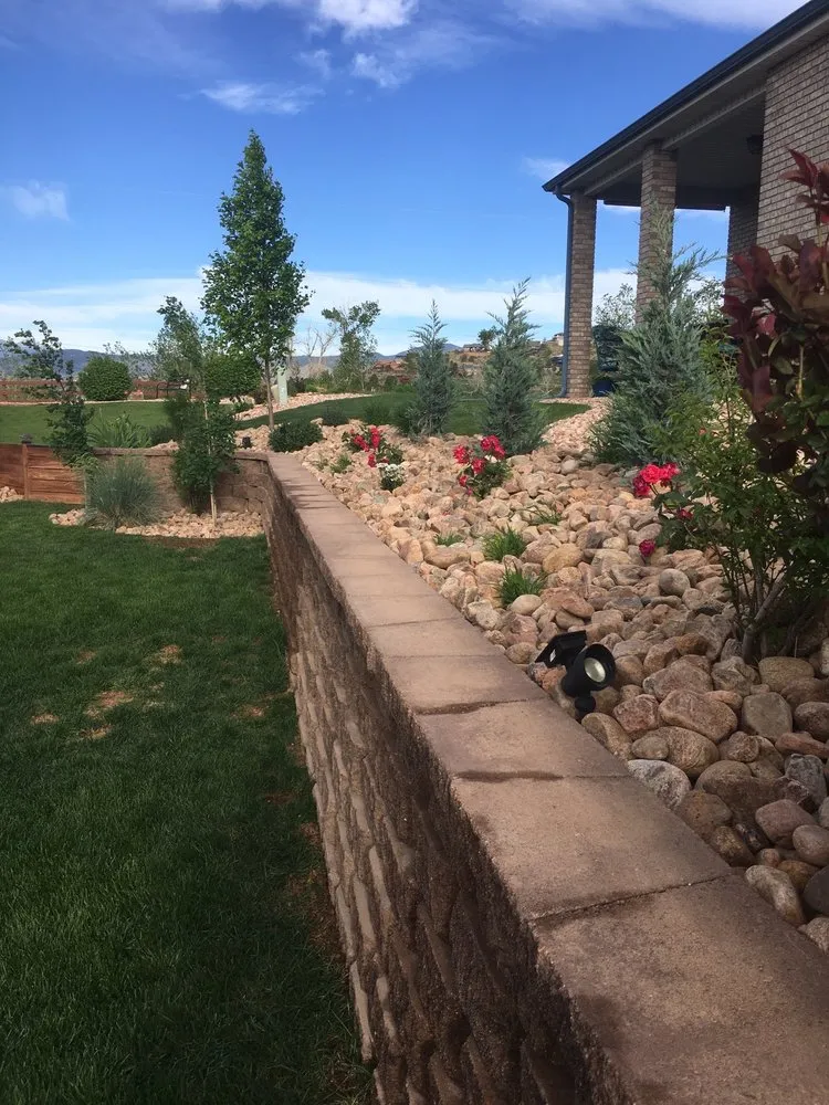Top-rated landscaping services with custom design in Loveland, CO by Summit Hauling & Services