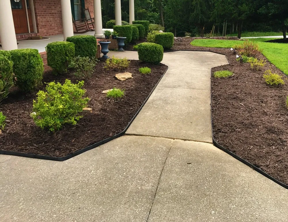 Professional yard cleanup service with custom design in Ashland, KY by Summit Landscapes