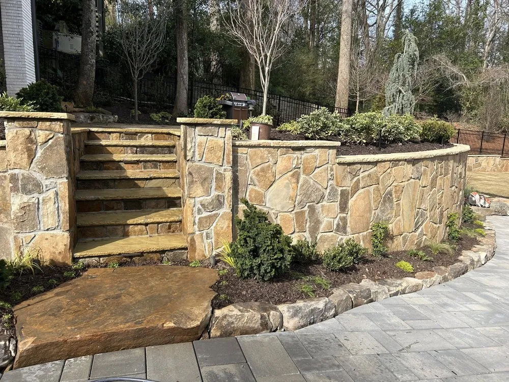 Local yard cleanup service for year-round maintenance in Atlanta, GA by Summit Landscaping Co