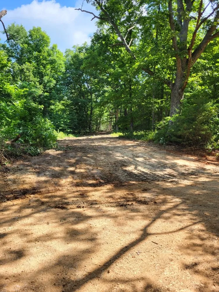 Trusted lawn care service in Bella Vista, AR by Sunnyside Earthworks & Land Management