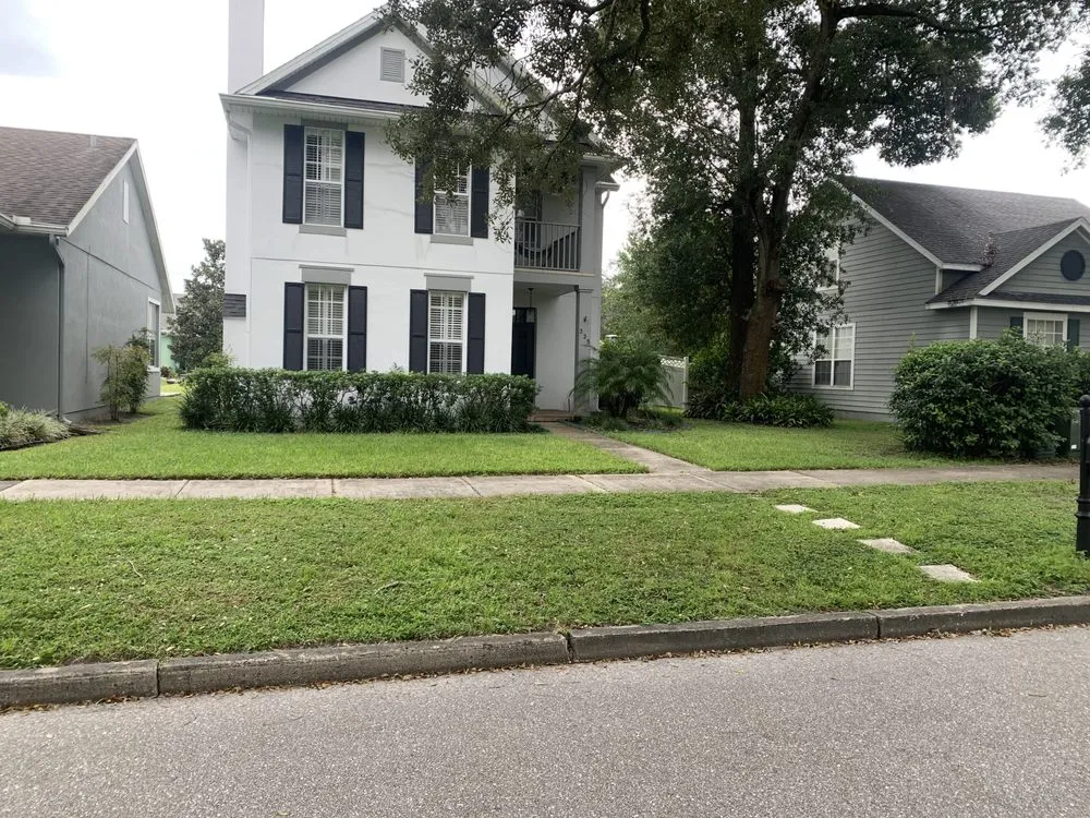 Affordable yard cleanup service for year-round maintenance in Lakeland, FL by SunnySide Lawn Care Services