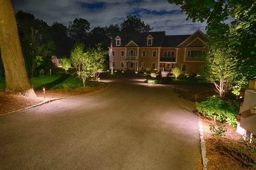 Professional lawn care service experts serving Norwell, MA - Sunshine Landscape Lighting