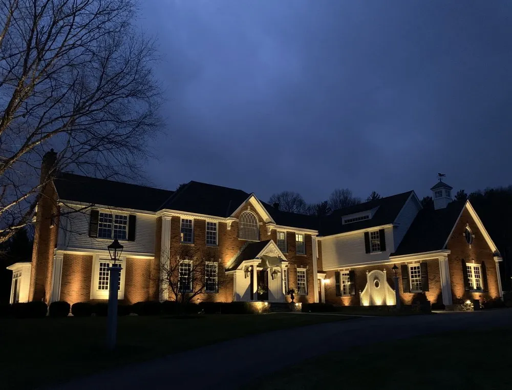 Affordable landscaping services for homes in Norwell, MA by Sunshine Landscape Lighting