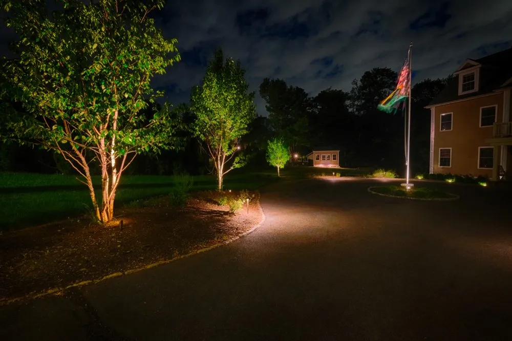 Professional lawn mowing service in Norwell, MA by Sunshine Landscape Lighting