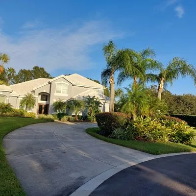 Sunshine Pro Lawn Care Logo