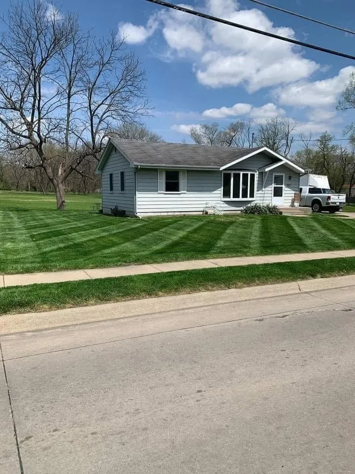 Local yard cleanup service for residential properties in Des Moines, IA by Super Short Mowing