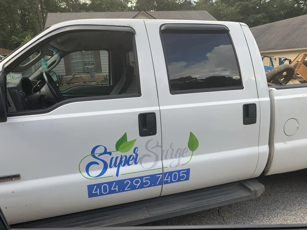 Custom landscape installation for homes in Griffin, GA by Super Surge Lawn Care And Landscaping