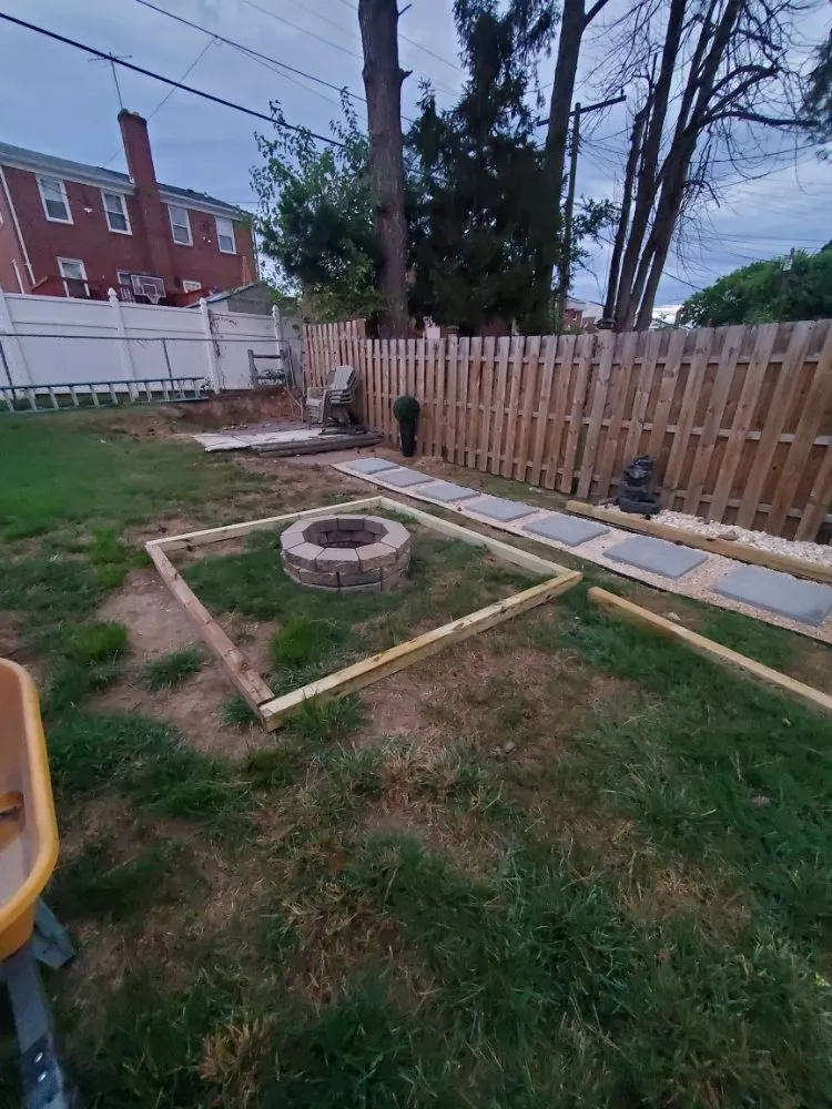 Local lawn care service for year-round maintenance in Baltimore, MD by Super Trimm Landscaping