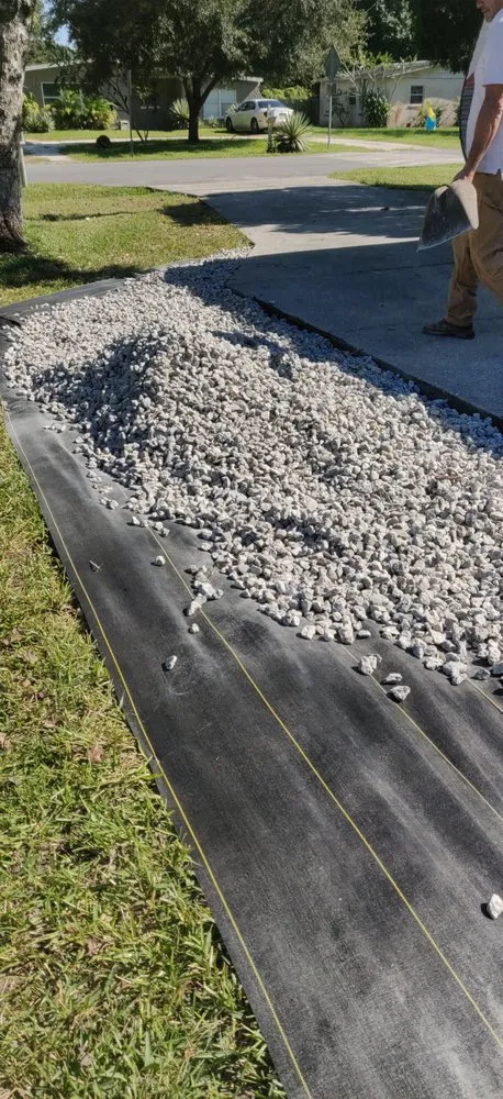 Professional lawn mowing service for outdoor upgrades in Palm Bay, FL by Superior Exterior Landscaping