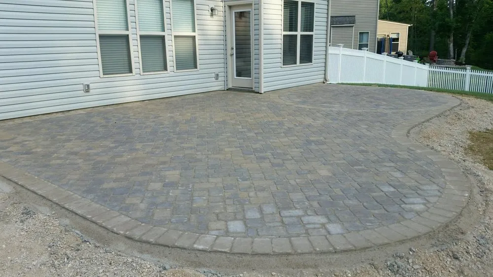 Reliable yard cleanup service for year-round maintenance in Matthews, NC by Superior Hardscapes
