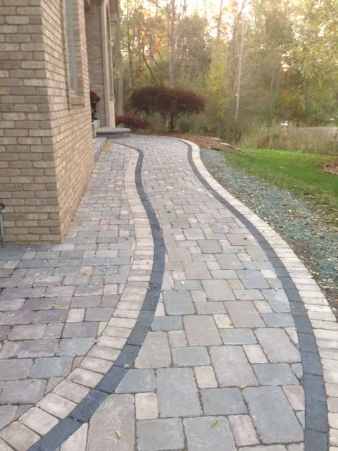 Affordable landscaping services for homes in Fenton, MI by Superior Lawn & Landscape
