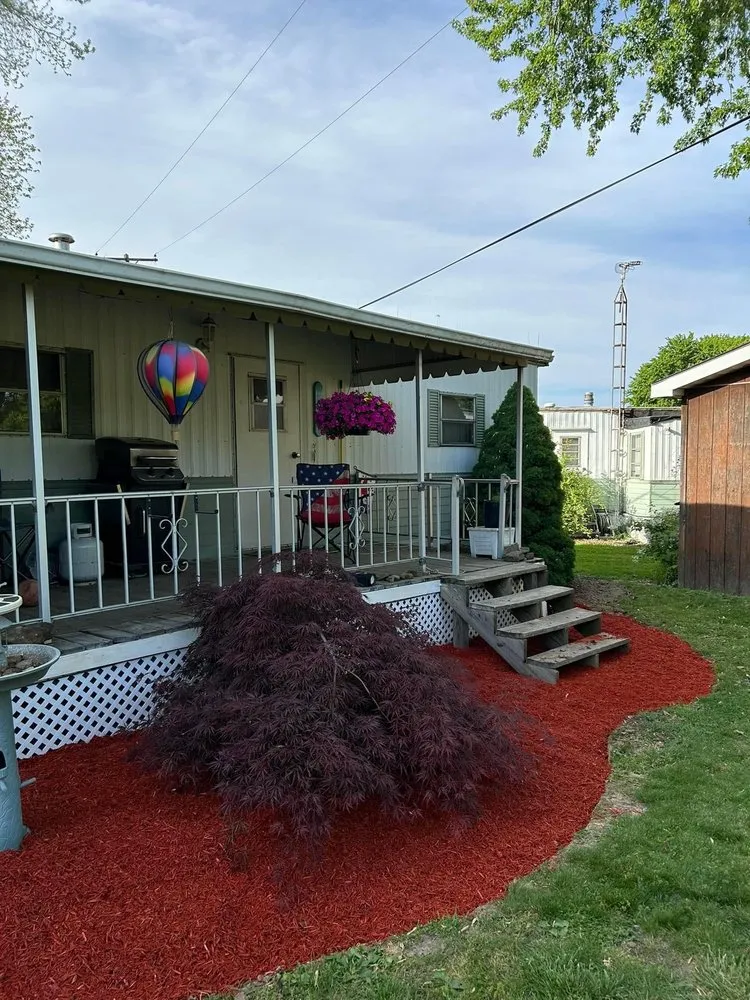 Professional outdoor landscaping with custom design in West Middlesex, PA by Superior Lawns & Roofing