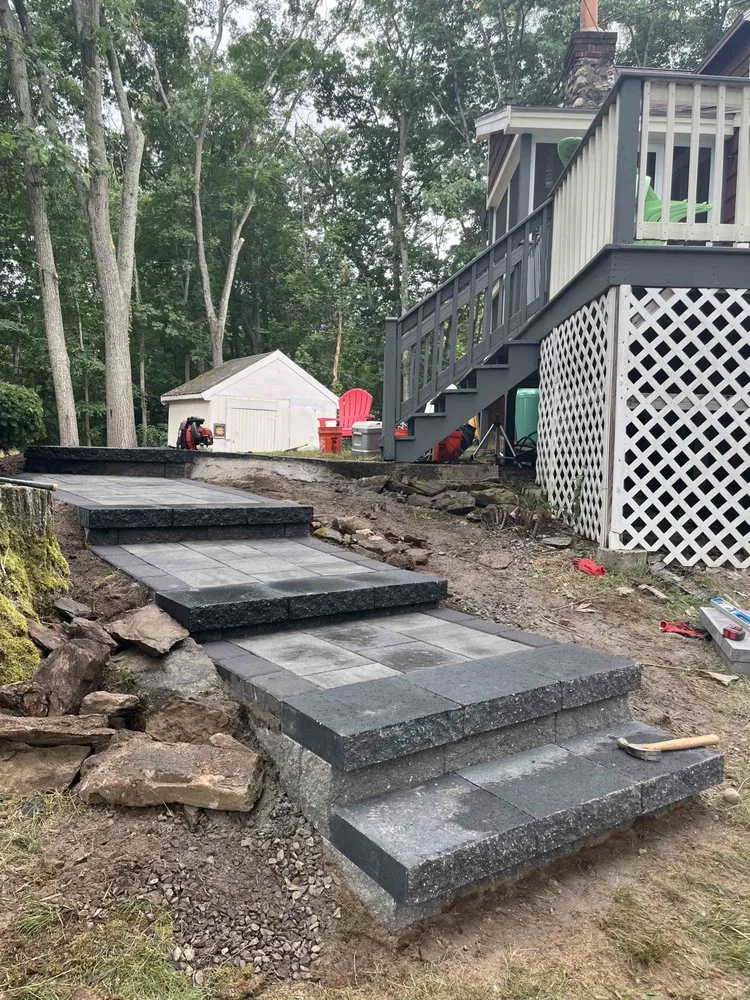 Expert yard maintenance for residential properties in Methuen, MA by Superior