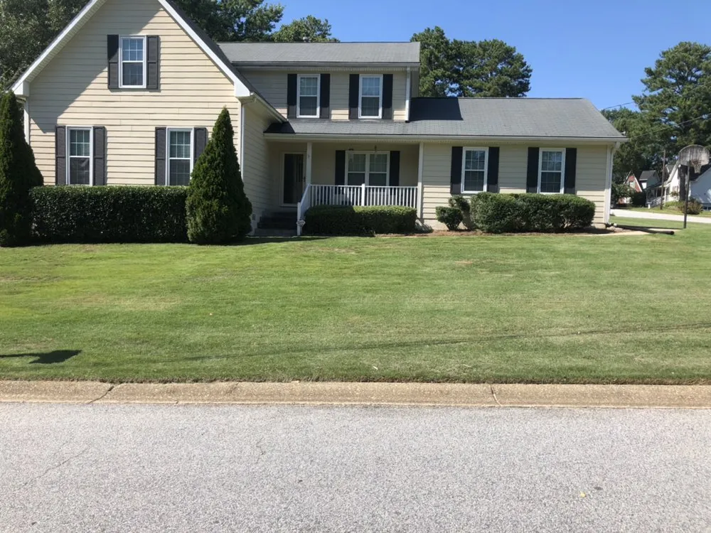 Professional lawn mowing service for beautiful yards in Douglasville, GA by Superior Pressure Washing Metro