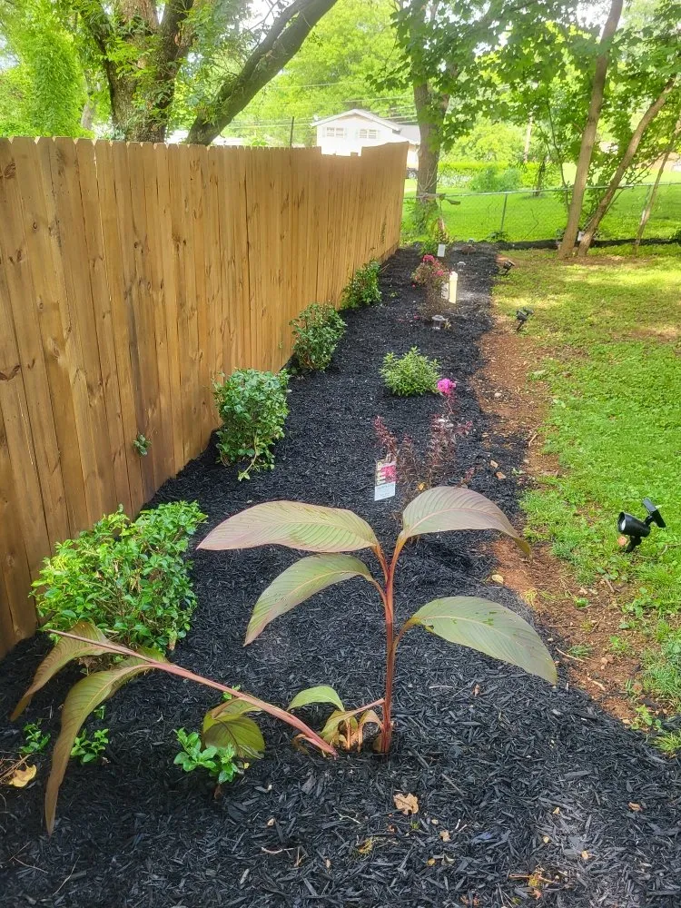Custom landscape installation for year-round maintenance in Huntsville, AL by Superior Southern Contracting