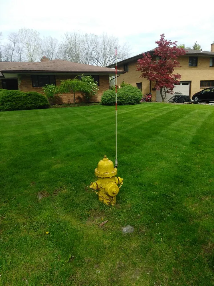 Professional yard cleanup service for residential properties across Poughkeepsie, NY - Supreme Blades Lawn Service