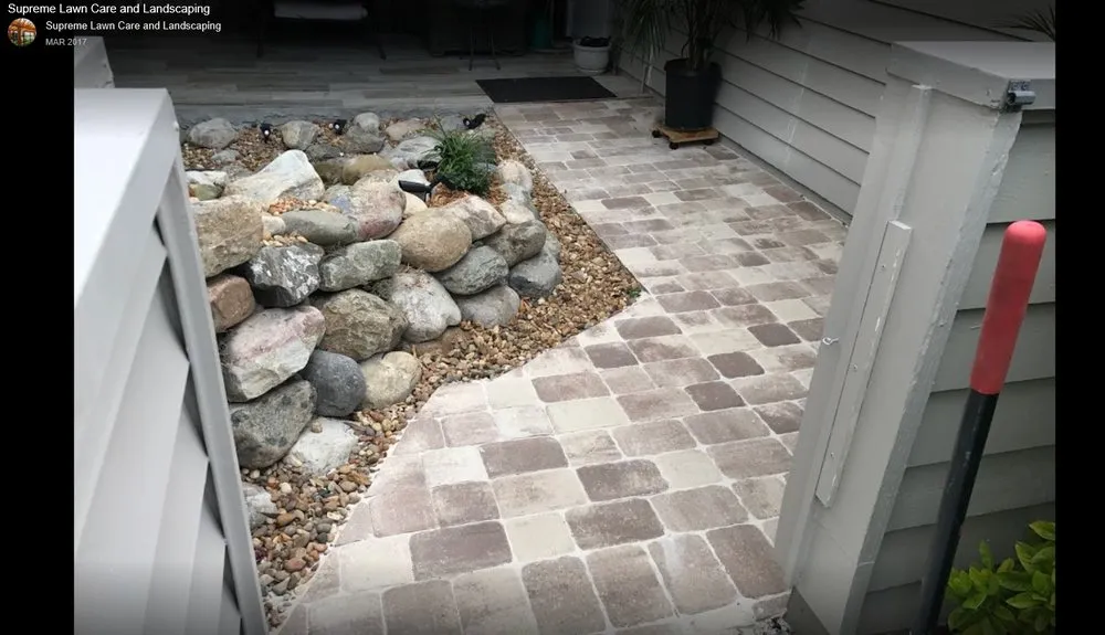 Custom landscape installation with custom design in Melbourne, FL by Supreme Lawn Care