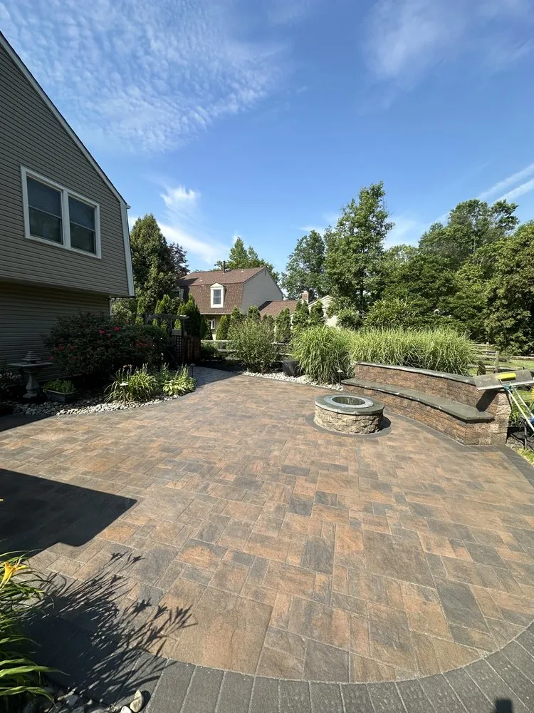 Custom yard cleanup service for year-round maintenance in East Brunswick, NJ by Supreme Outdoor Maintenance