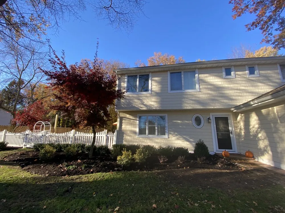 Custom outdoor landscaping for year-round maintenance in Little Silver, NJ by Sure Landscape & Design