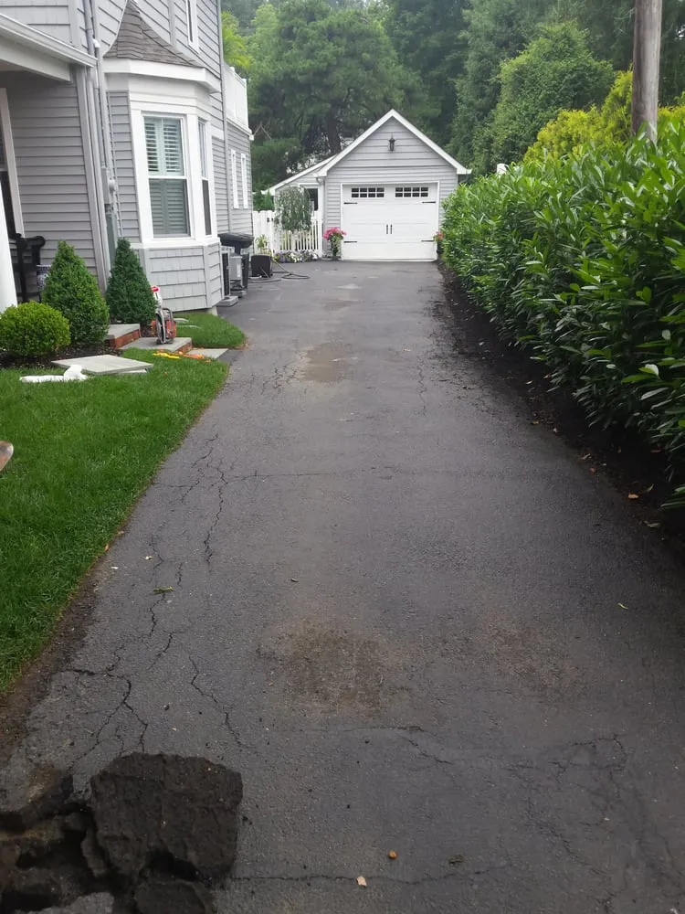 Local landscape design with custom design in Little Silver, NJ by Sure Landscape & Design