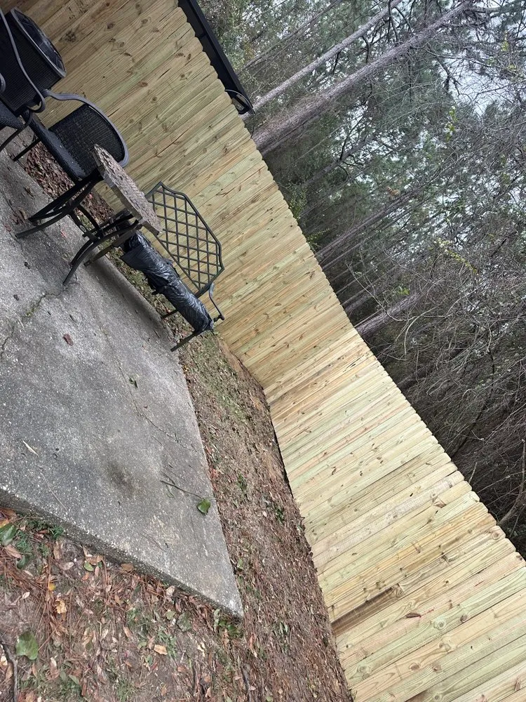 Custom landscape design in Cantonment, FL by Sure Shot Outdoor Services