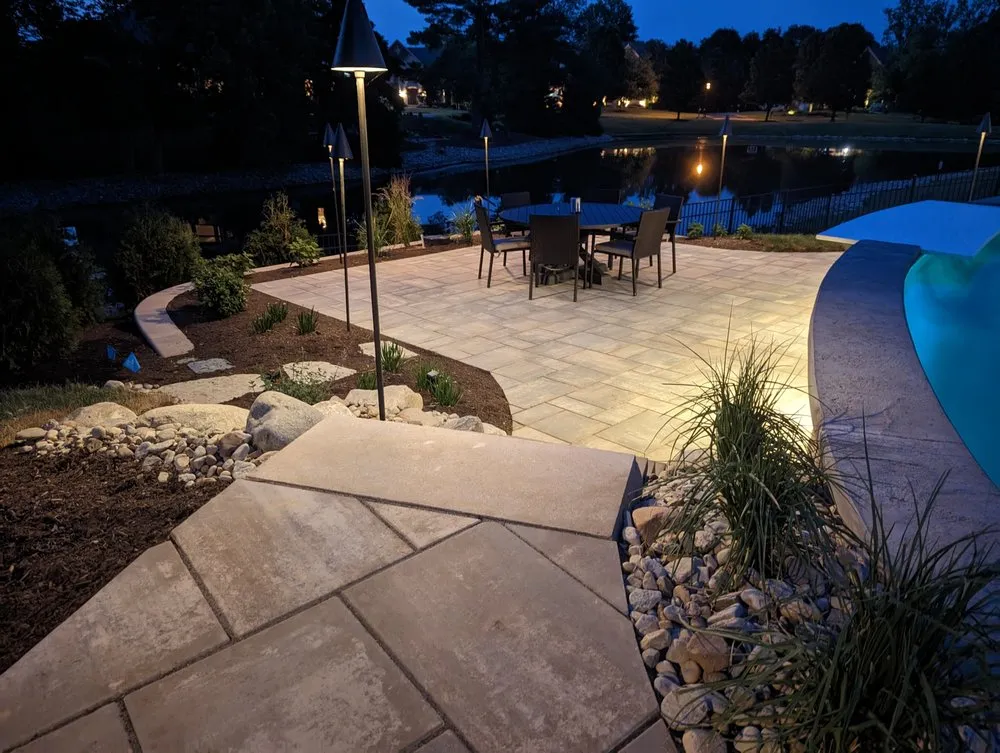 Custom landscape installation with custom design in Loveland, OH by Surroundings