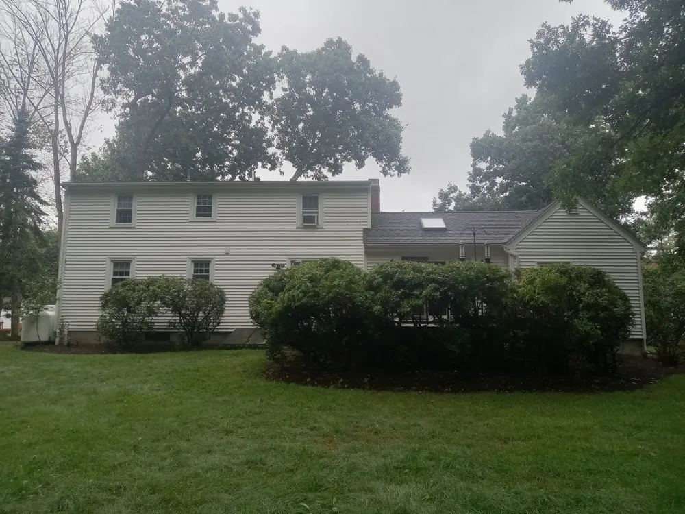 Professional garden landscaping in Raynham, MA by Sustainable Lawncare