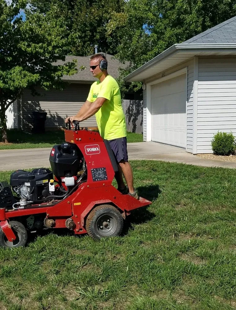 Expert yard maintenance for beautiful yards across Marshfield, MO - SutherLANDscape Lawn Services