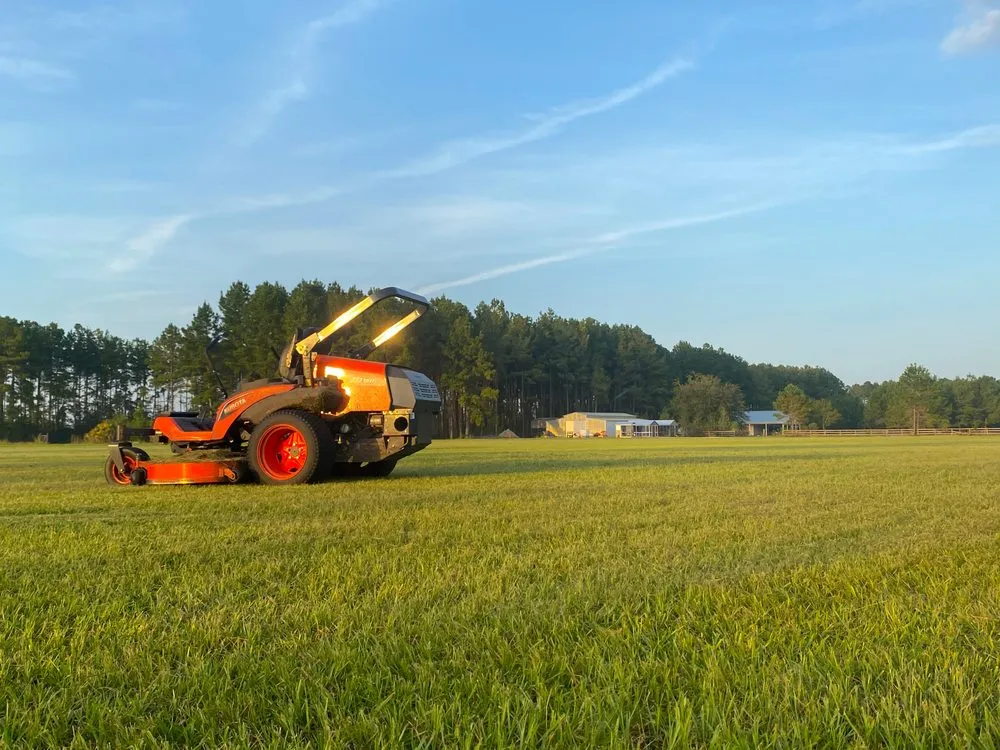 Custom lawn mowing service for residential properties in Wellborn, FL by Suwannee Outdoor Solutions