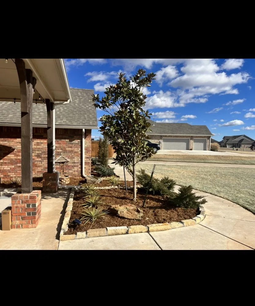 Custom landscape design for outdoor upgrades in Edmond, OK by Swaiss Solutions Lawn and Landscape