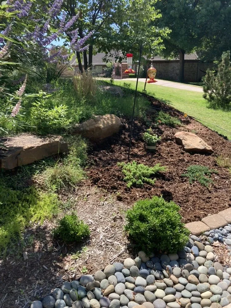 Affordable residential landscaping for residential properties in Edmond, OK by Swaiss Solutions Lawn and Landscape