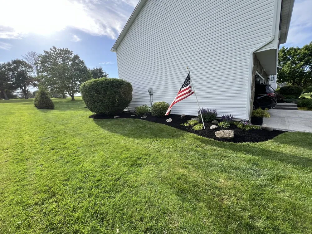 Professional landscape installation with custom design in Auburn, NY by Sweeney Brothers Landscaping