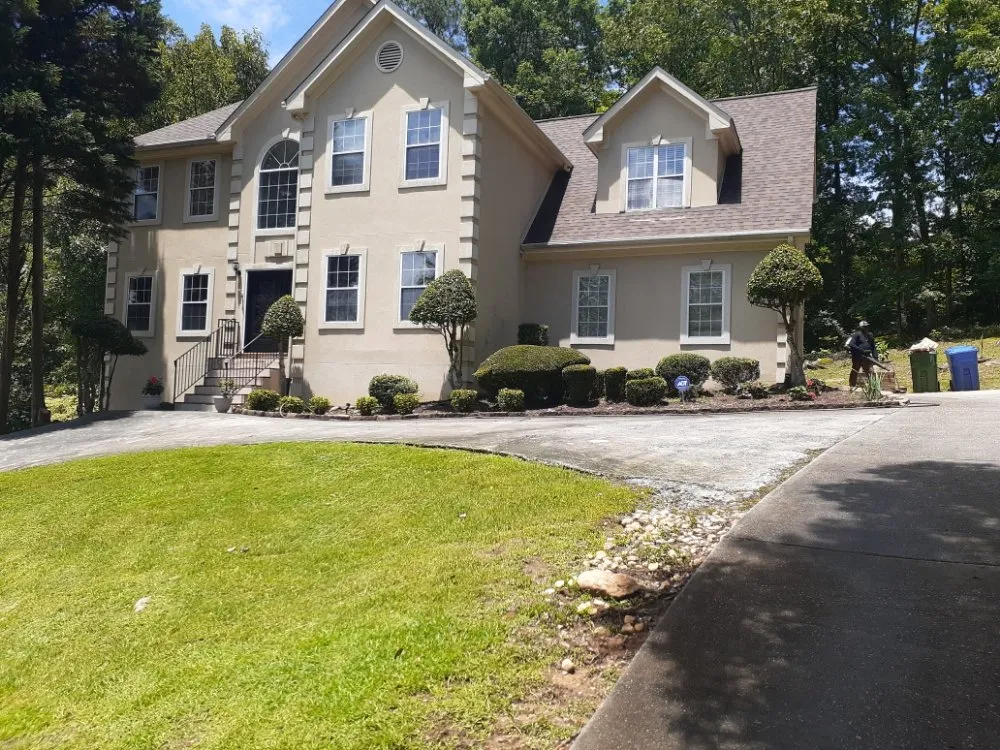 Local landscaping services for year-round maintenance in Atlanta, GA by Sweet Rose Incorporated Lawn Care