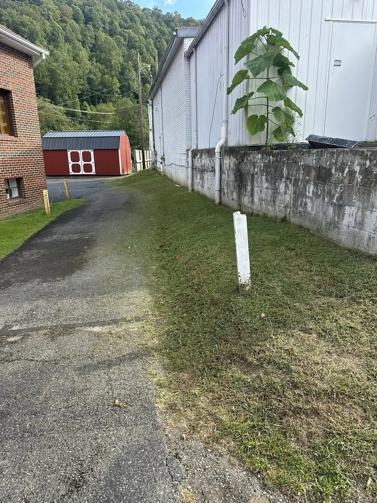 Professional lawn mowing service for outdoor upgrades in McAndrews, KY by Swift solutions