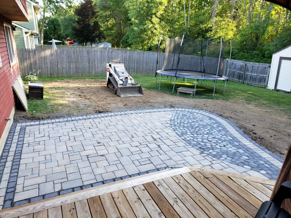 Trusted yard cleanup service for beautiful yards in East Syracuse, NY by SWIMM LANDSCAPING