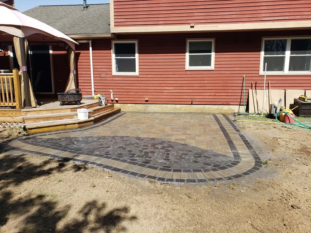 Affordable lawn care service for residential properties in East Syracuse, NY by SWIMM LANDSCAPING