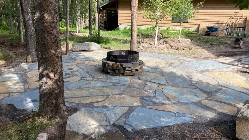 Custom landscaping services for beautiful yards in Ashton, ID by Swiss Precision Enterprises