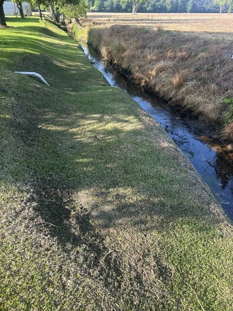 Custom lawn mowing service with custom design in Whiteville, NC by Sykes Lawncare