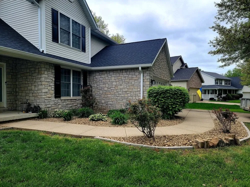 Expert lawn care service for homes in Bloomington, IN by Sylvie Rose Home & Outdoor Services