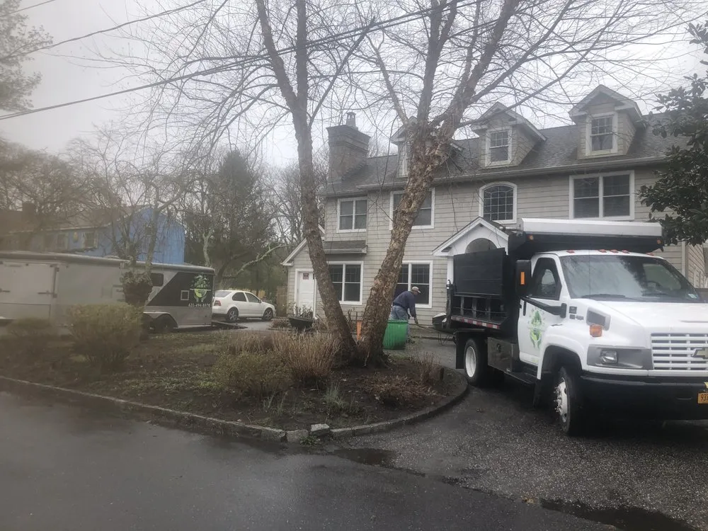 Trusted lawn care service for homes across Center Moriches, NY - Symbiotic Property And Landscape Management