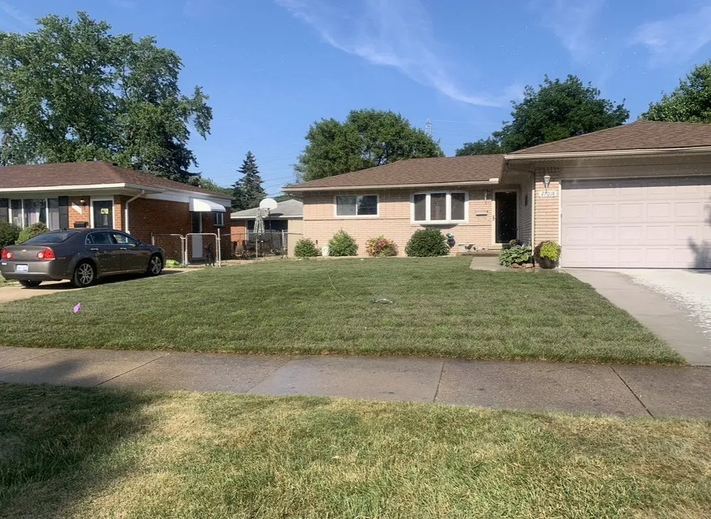Custom residential landscaping in Fraser, MI by Synergy Lawnscape