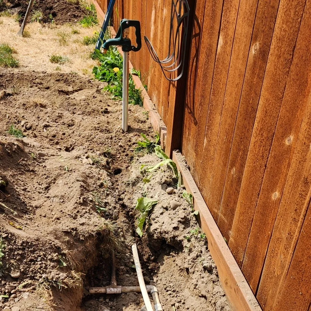 Professional garden landscaping for residential properties in Seattle, WA by Synthetic Turf Sprinklers Retaining Wall Drainage