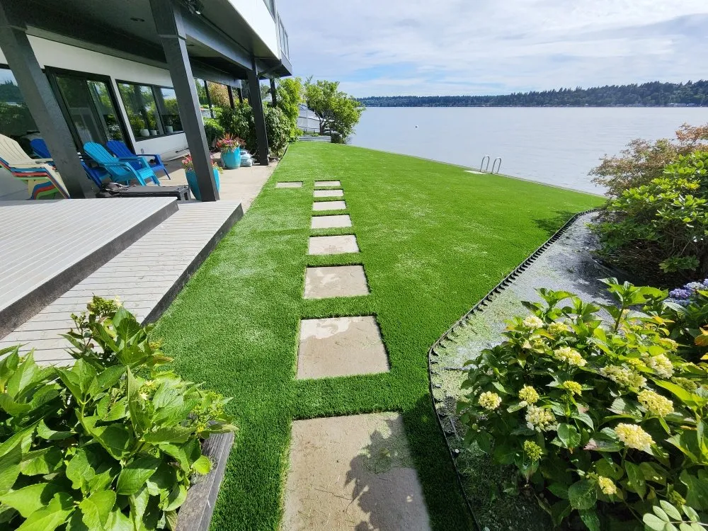 Top-rated outdoor landscaping for year-round maintenance in Seattle, WA by Synthetic Turf Sprinklers Retaining Wall Drainage