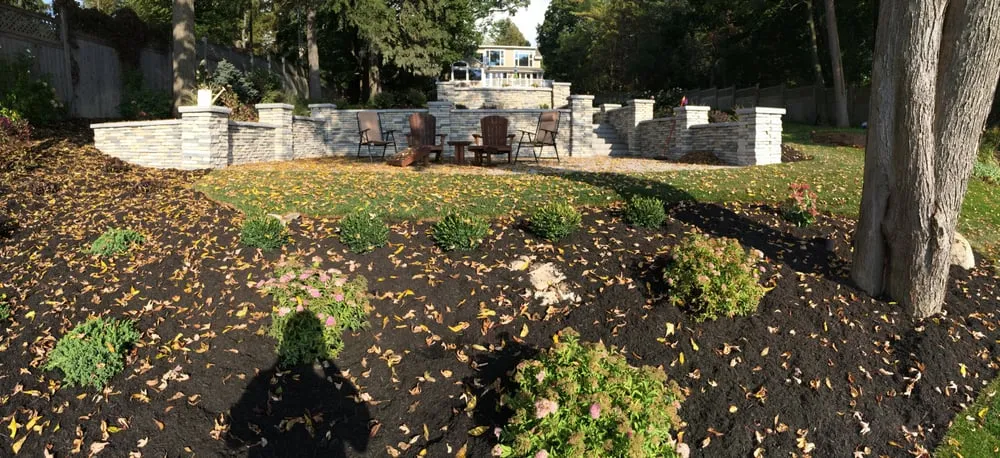 Expert yard cleanup service in East Syracuse, NY by Syracuse Lightscapes