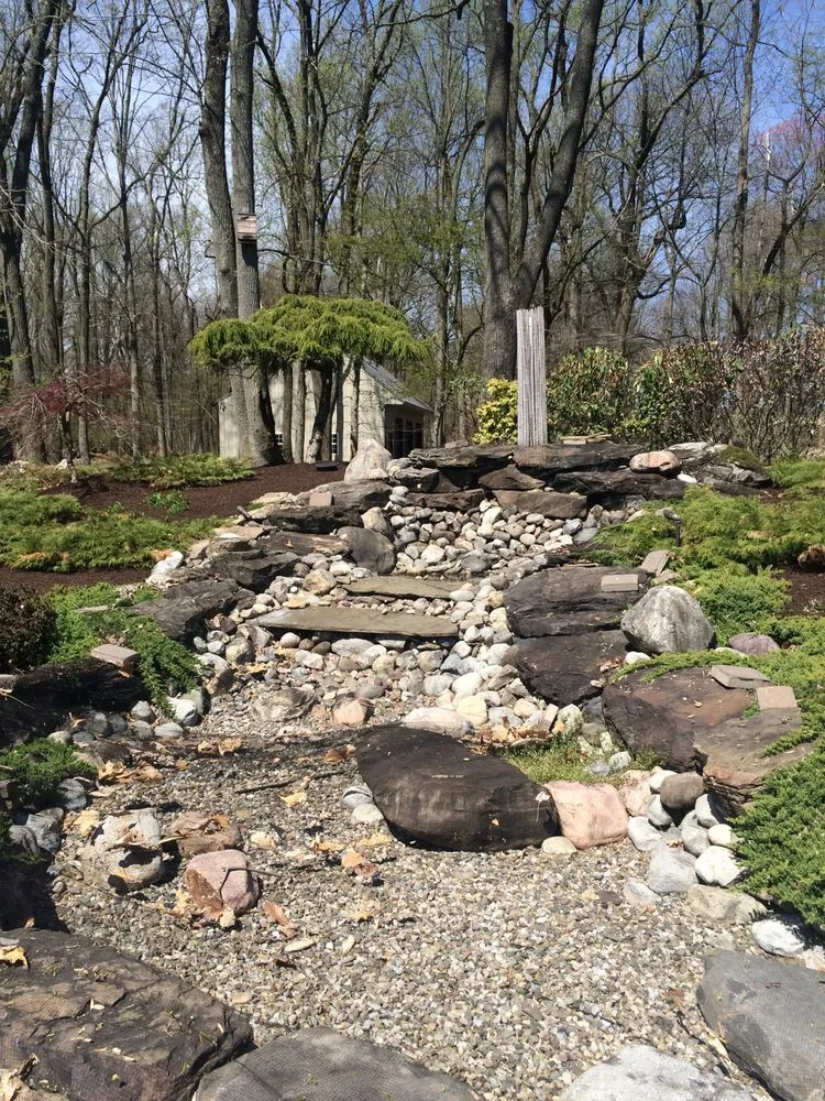 Custom lawn mowing service with custom design in Bensalem, PA by Syron