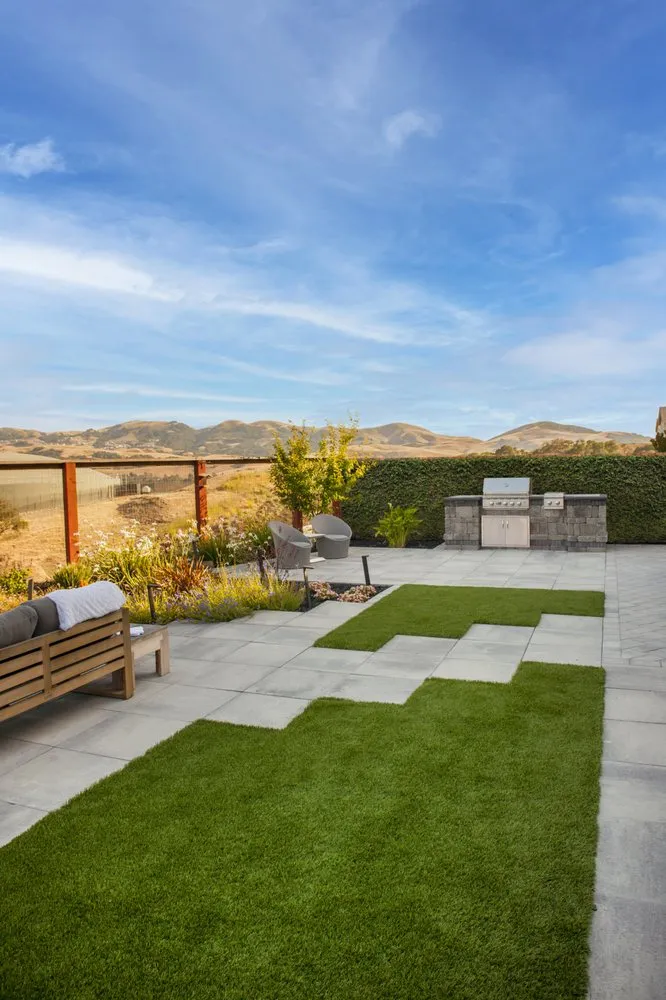 Custom landscape design with custom design in Austin, TX by System Pavers