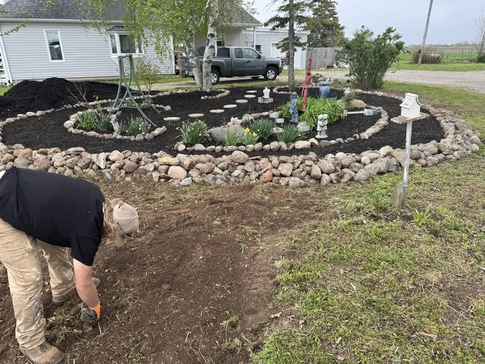 Custom landscape design in Fairgrove, MI by T & A Lawn Care