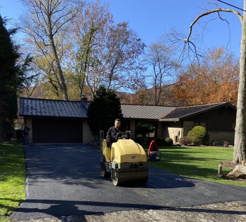 Professional yard maintenance for residential properties in Pittsburgh, PA by T & H Paving