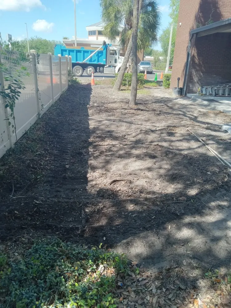 Affordable yard maintenance with custom design in Brooksville, FL by T & J Land Services