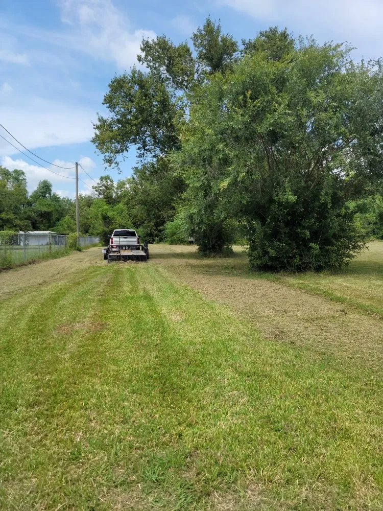 Custom lawn mowing service with custom design across Erath, LA - T & L Lawn Service